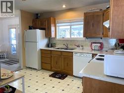 Kitchen with lots of cupboards -