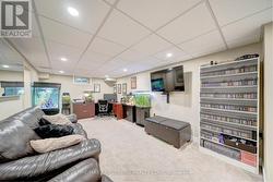 Basement family room combined with home office -