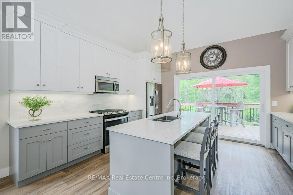 18 - 744 Nelson Street W, Norfolk (Port Dover), ON - Indoor Photo Showing Kitchen With Double Sink With Upgraded Kitchen