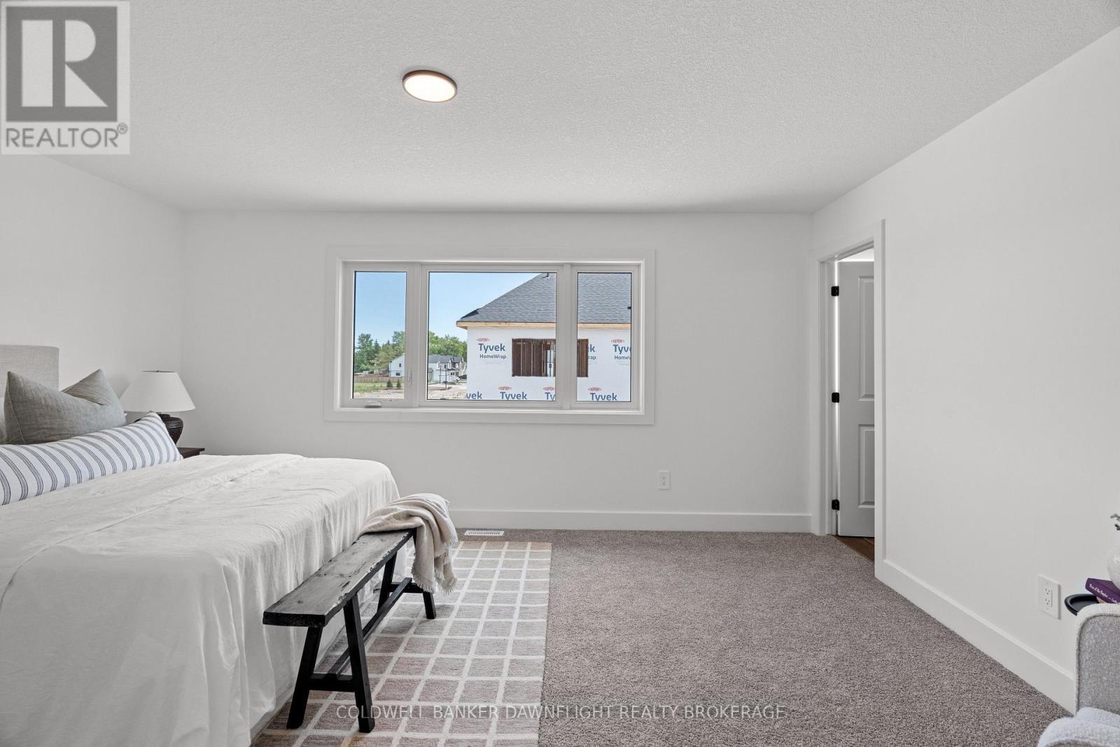 18 - 147 Scotts Drive, Lucan Biddulph (Lucan), ON - Indoor Photo Showing Bedroom