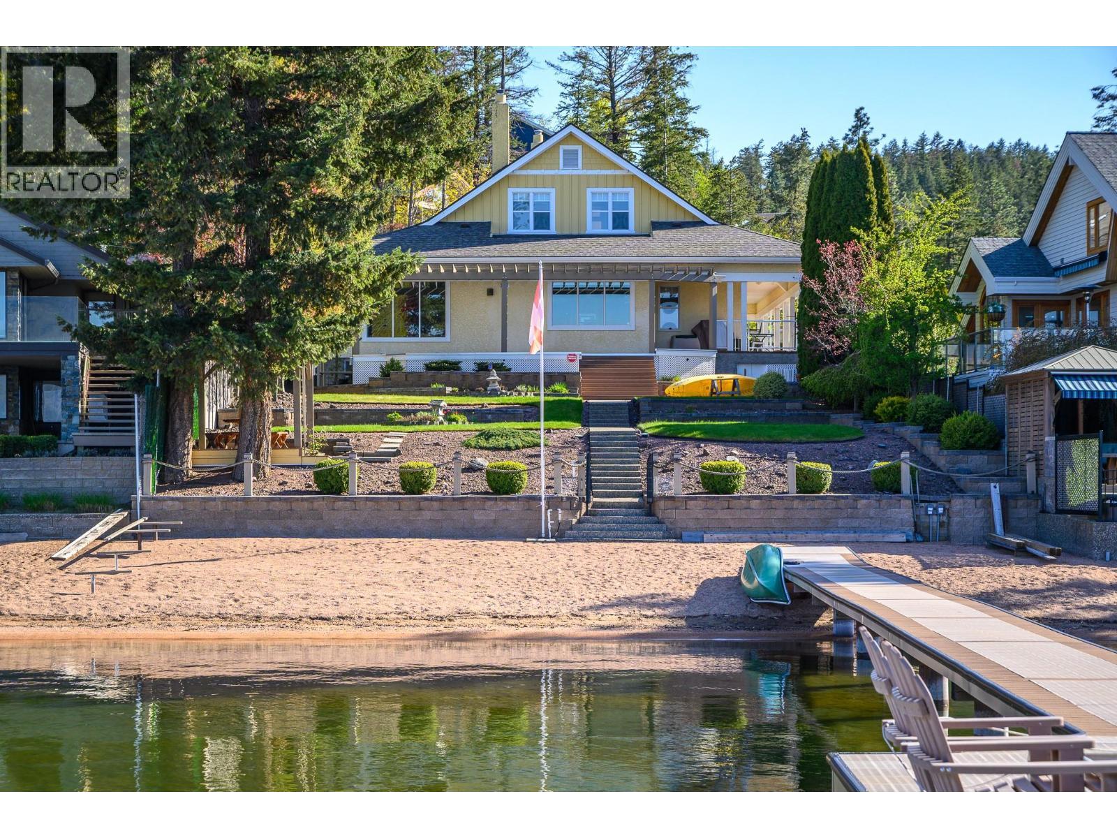 9739 Delcliffe Road, Vernon, BC - Outdoor With Body Of Water With Deck Patio Veranda With Facade