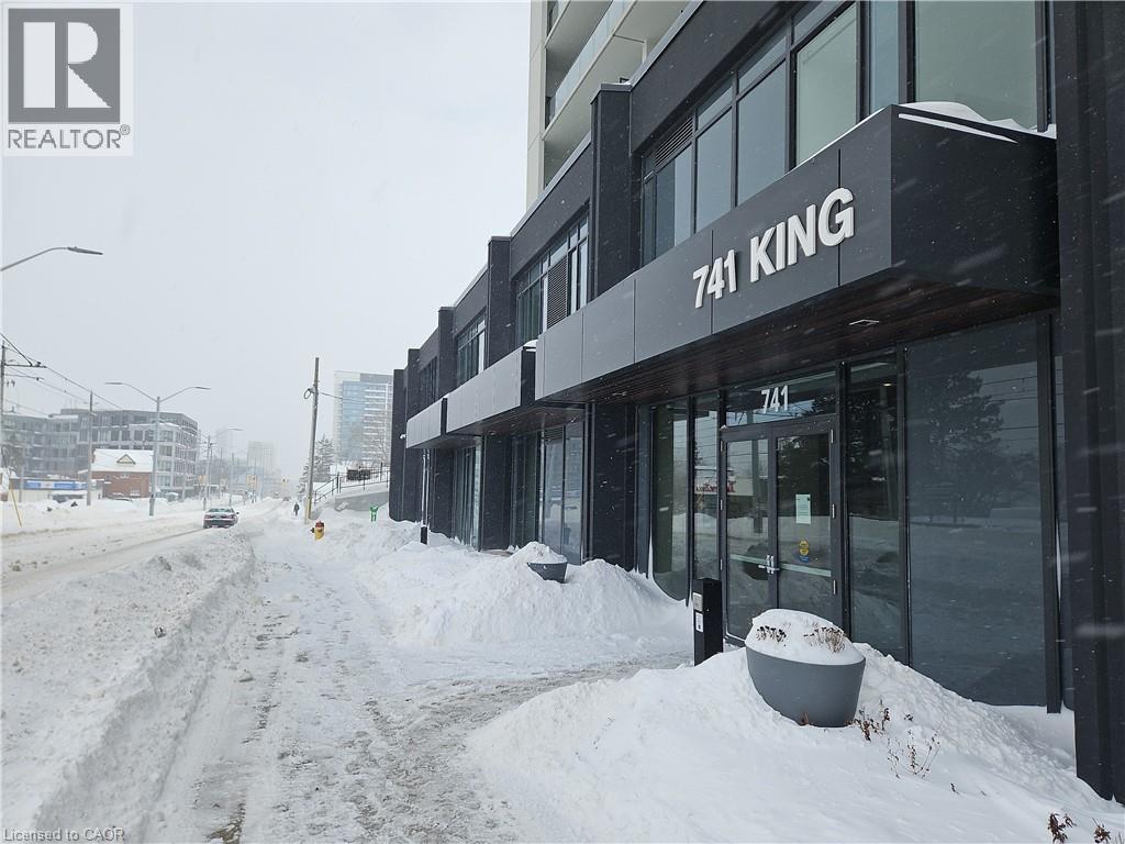 View of snow covered property - 741 King Street W Unit# 1207, Kitchener, ON - Outdoor