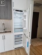 Storage area featuring a sink -