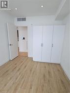 Unfurnished bedroom featuring baseboards, recessed lighting, visible vents, and light wood-style floors -