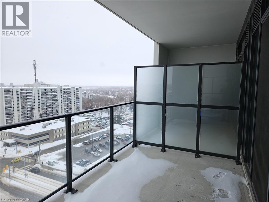 View of snow covered back of property - 741 King Street W Unit# 1207, Kitchener, ON - Outdoor With Balcony With View With Exterior