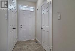Front entrance: closet left, powder room -