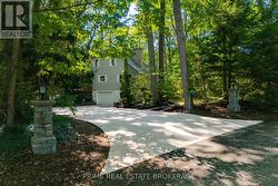 Stone lit pillars add timeless curb appeal -