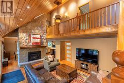 2-story Grand Room w/ fieldstone gas fireplace -