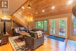 2-story Grand Room flanked by large windows -