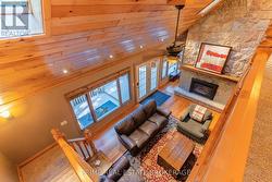2-story grand room w/ rich natural materials -