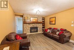 Basement rec room w/ gas fireplace -