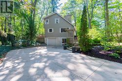 Large stamped concrete driveway fits 6+ vehicles -