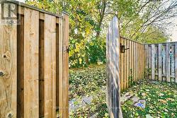 Gate to Pathway leading to Simcoe St. Buses -