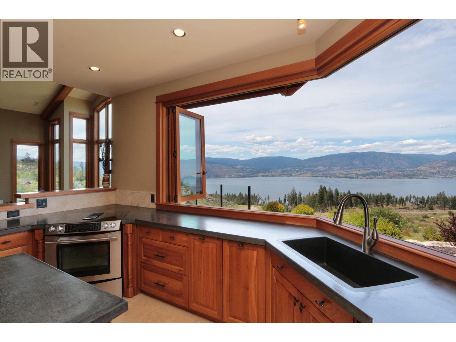 105 Timberline Road, Kelowna, BC - Photo Showing Kitchen With Body Of Water