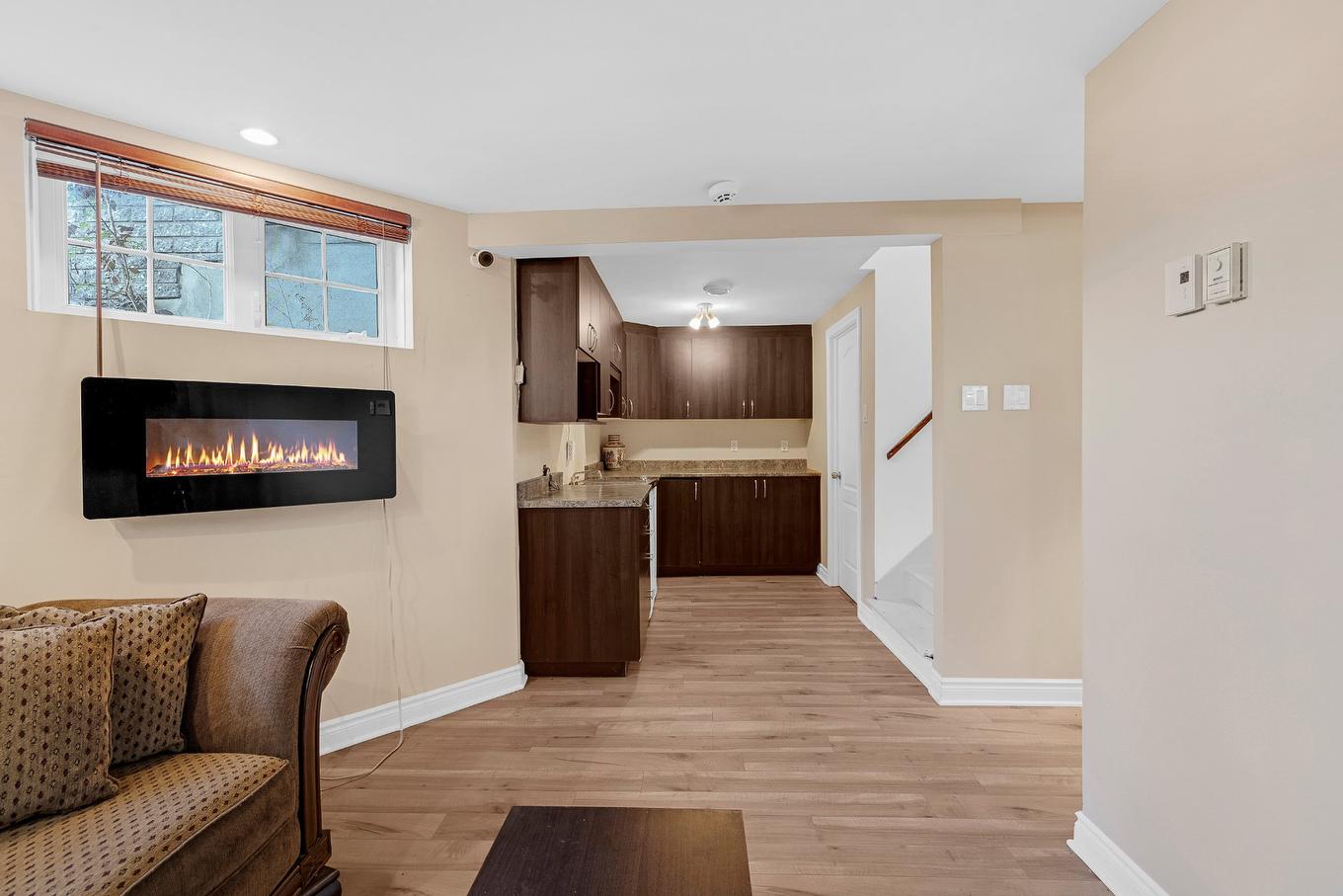 Basement - 8235 Av. Oceanie, Brossard, QC - Indoor With Fireplace