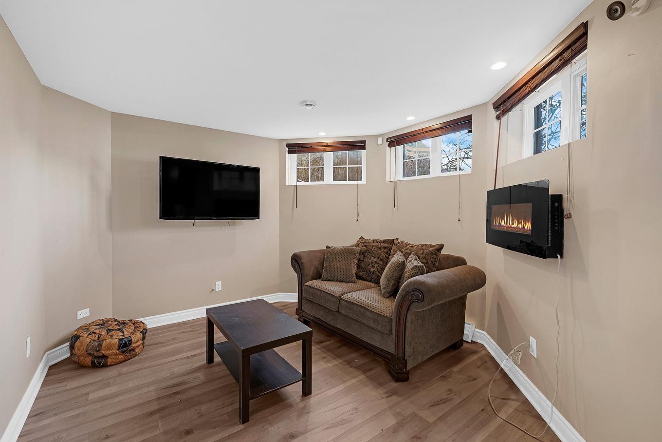Basement - 8235 Av. Oceanie, Brossard, QC - Indoor With Fireplace