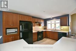 Kitchen with Newer Appliances and Large Window -