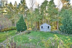 Backyard Views of treed Town Property with Trail -