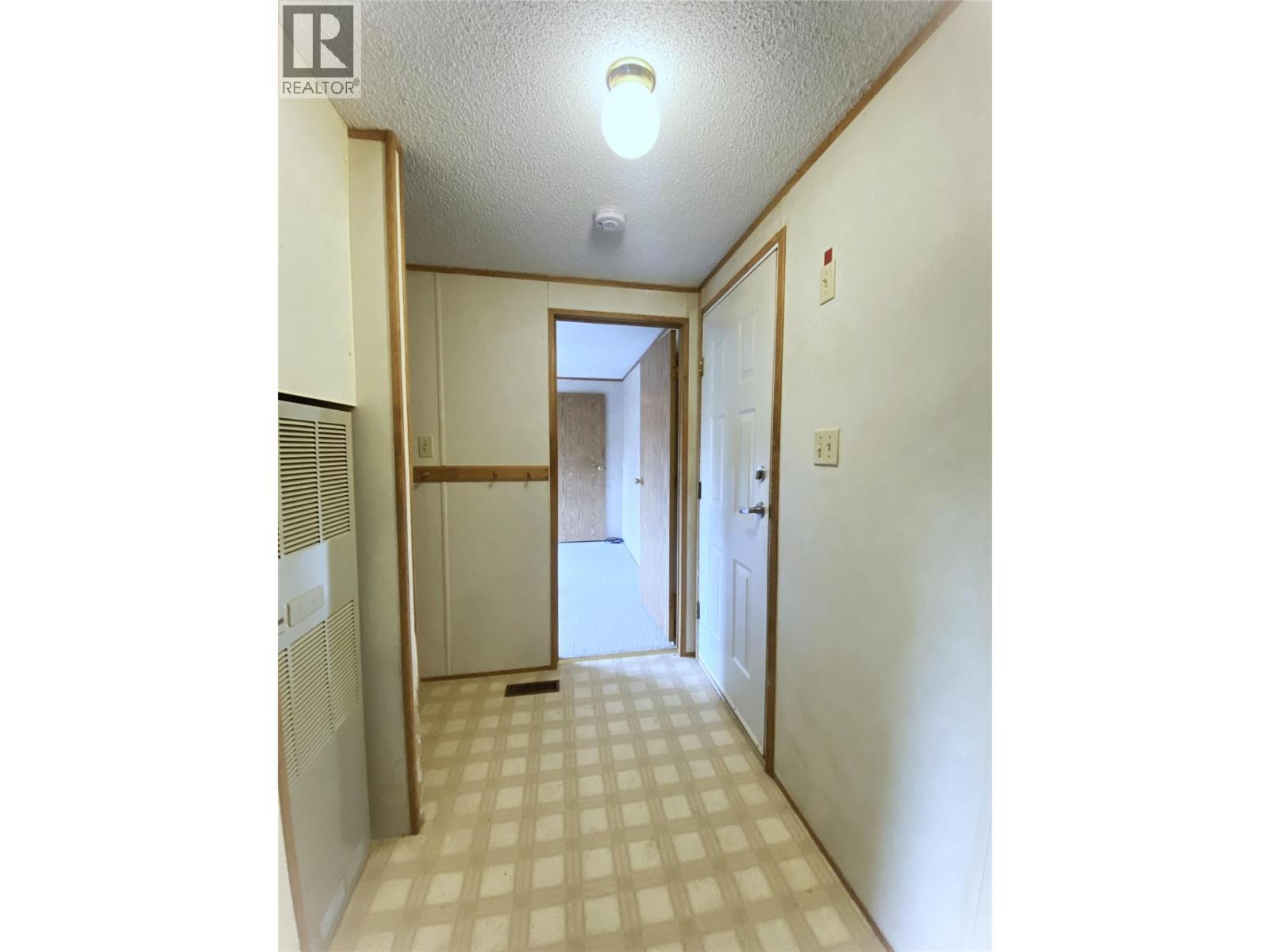 Hallway to Primary Bedroom - 655 Caouette Road, Sorrento, BC