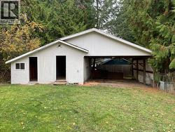 Detached driving shed with workshop & storage -