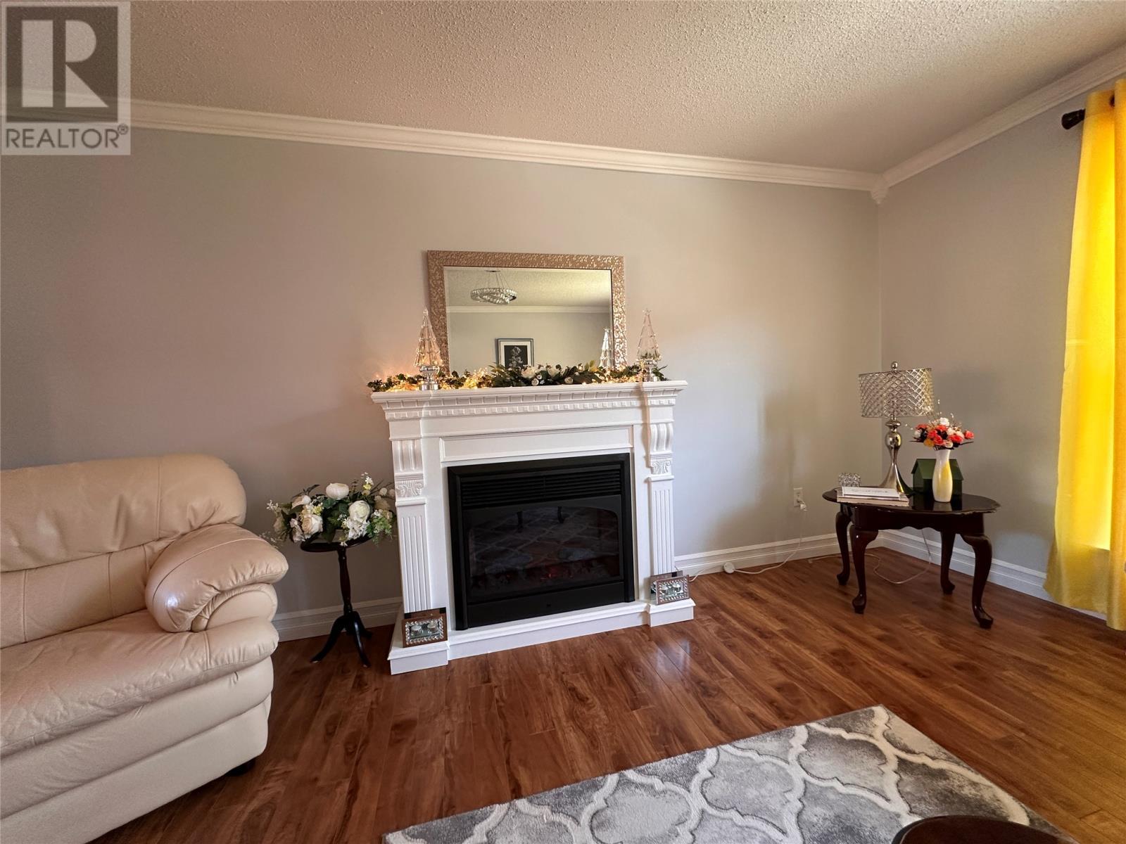 130 Main Road, Rushoon, NL - Indoor Photo Showing Living Room With Fireplace