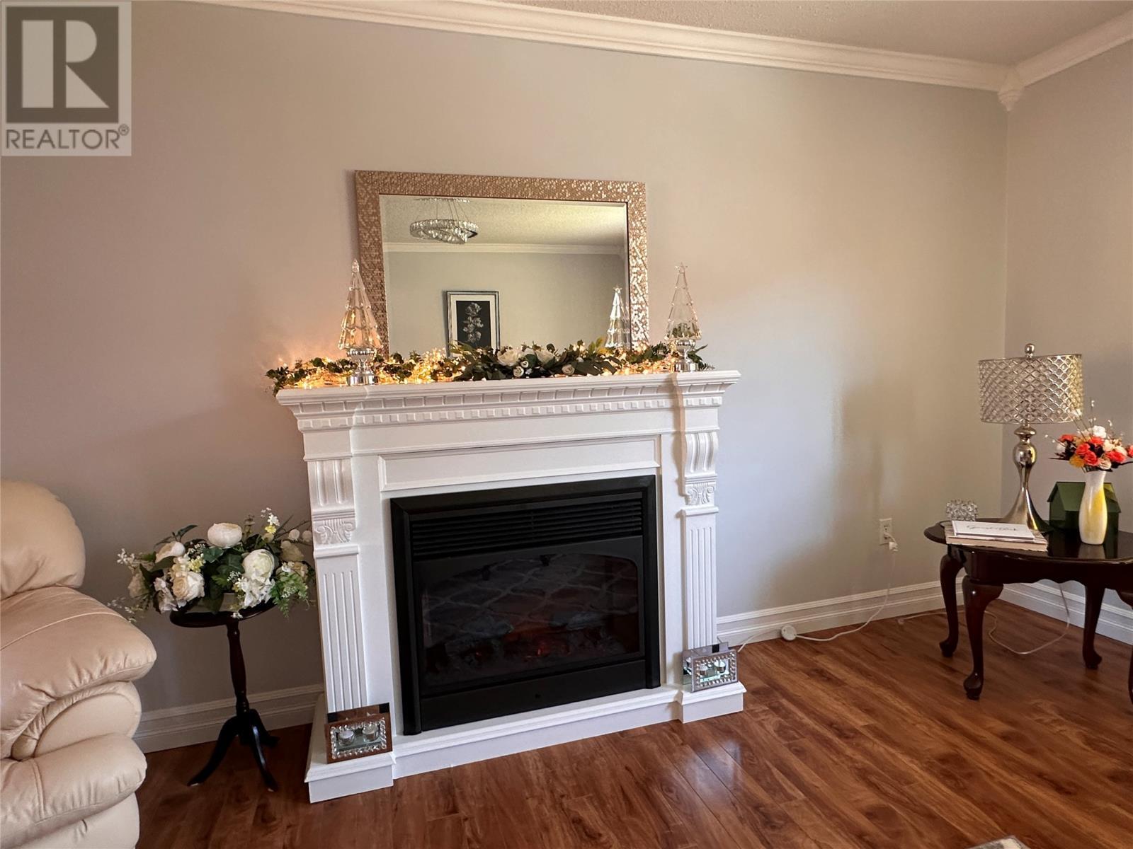 130 Main Road, Rushoon, NL - Indoor Photo Showing Living Room With Fireplace