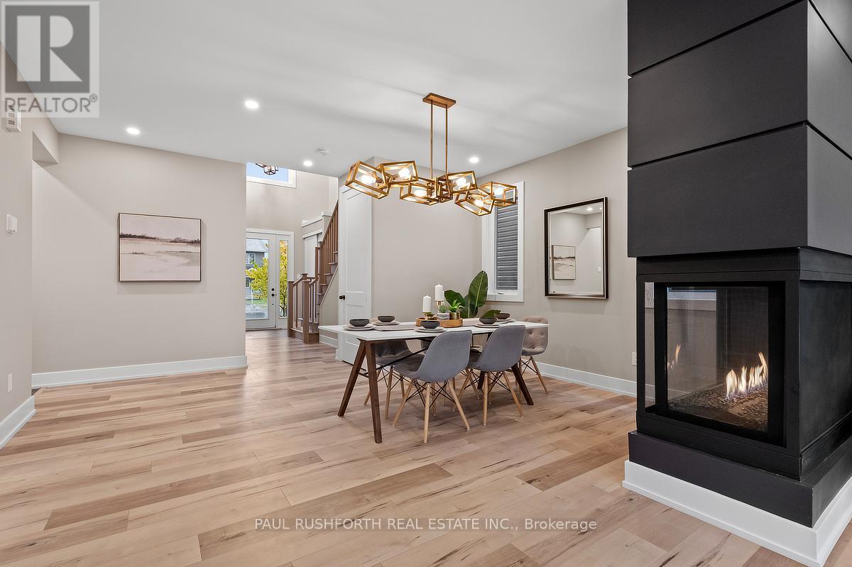 Model Home-See remarks - 123 Chandelle Private, Ottawa, ON - Indoor Photo Showing Dining Room With Fireplace