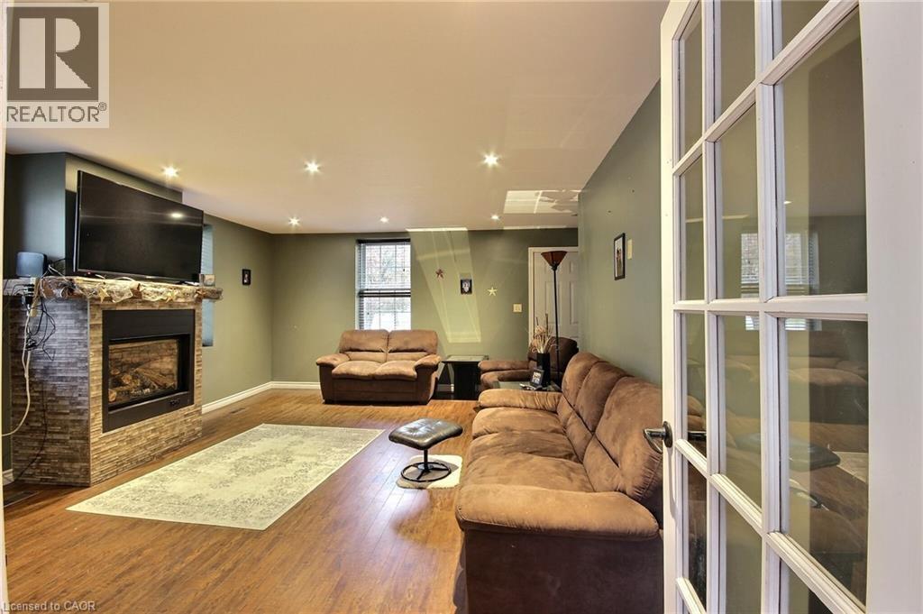 2081 John Street, Howick, ON - Indoor Photo Showing Living Room With Fireplace