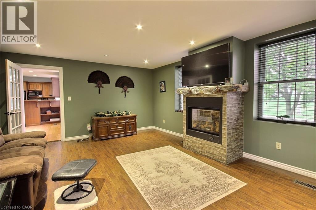 2081 John Street, Howick, ON - Indoor Photo Showing Living Room With Fireplace