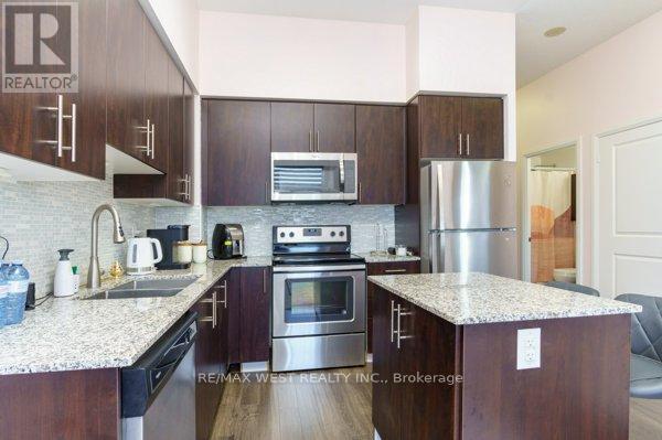 314 - 3600 Highway 7 Road, Vaughan, ON - Indoor Photo Showing Kitchen With Stainless Steel Kitchen With Double Sink With Upgraded Kitchen