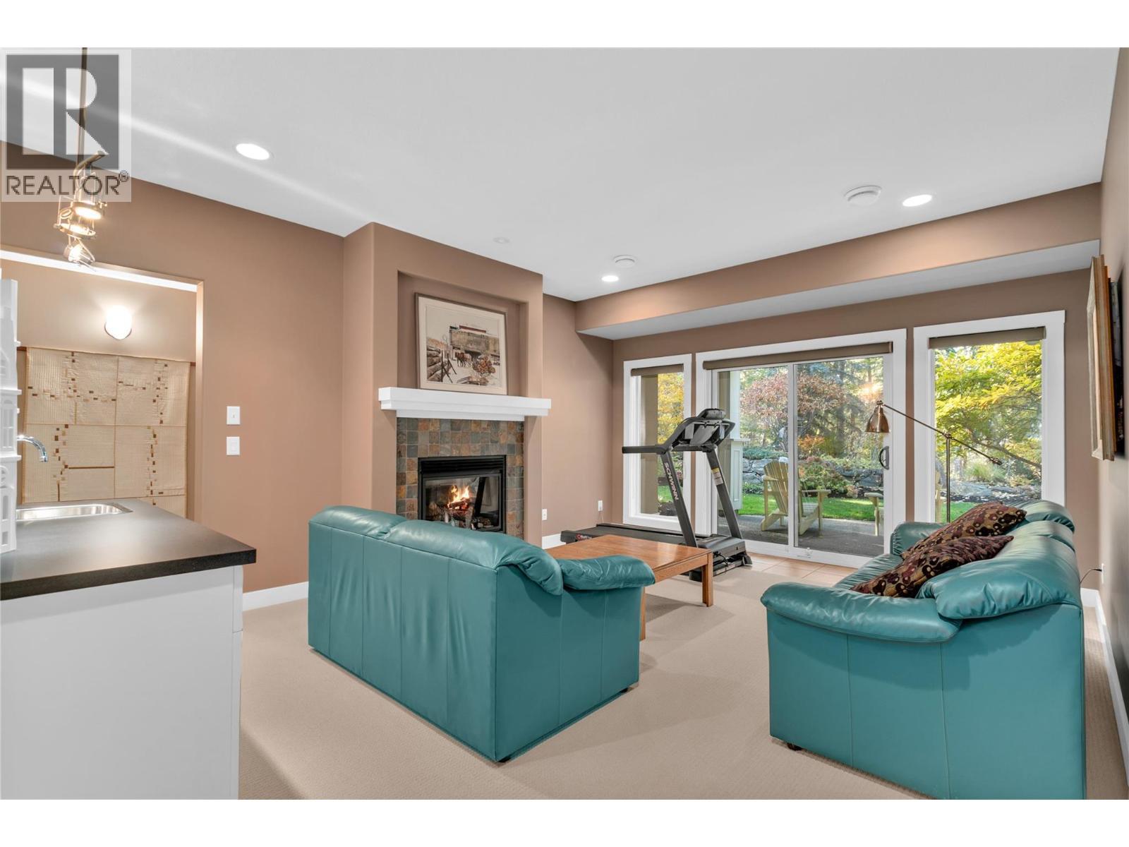 4116 Gallaghers Woodlands Drive S, Kelowna, BC - Indoor With Fireplace