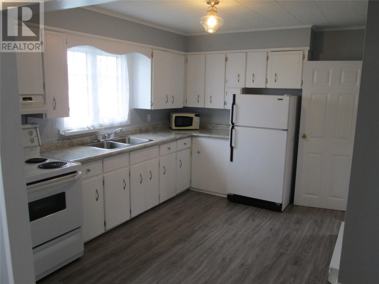 161 Main Street, Point Leamington, NL - Indoor Photo Showing Kitchen With Double Sink