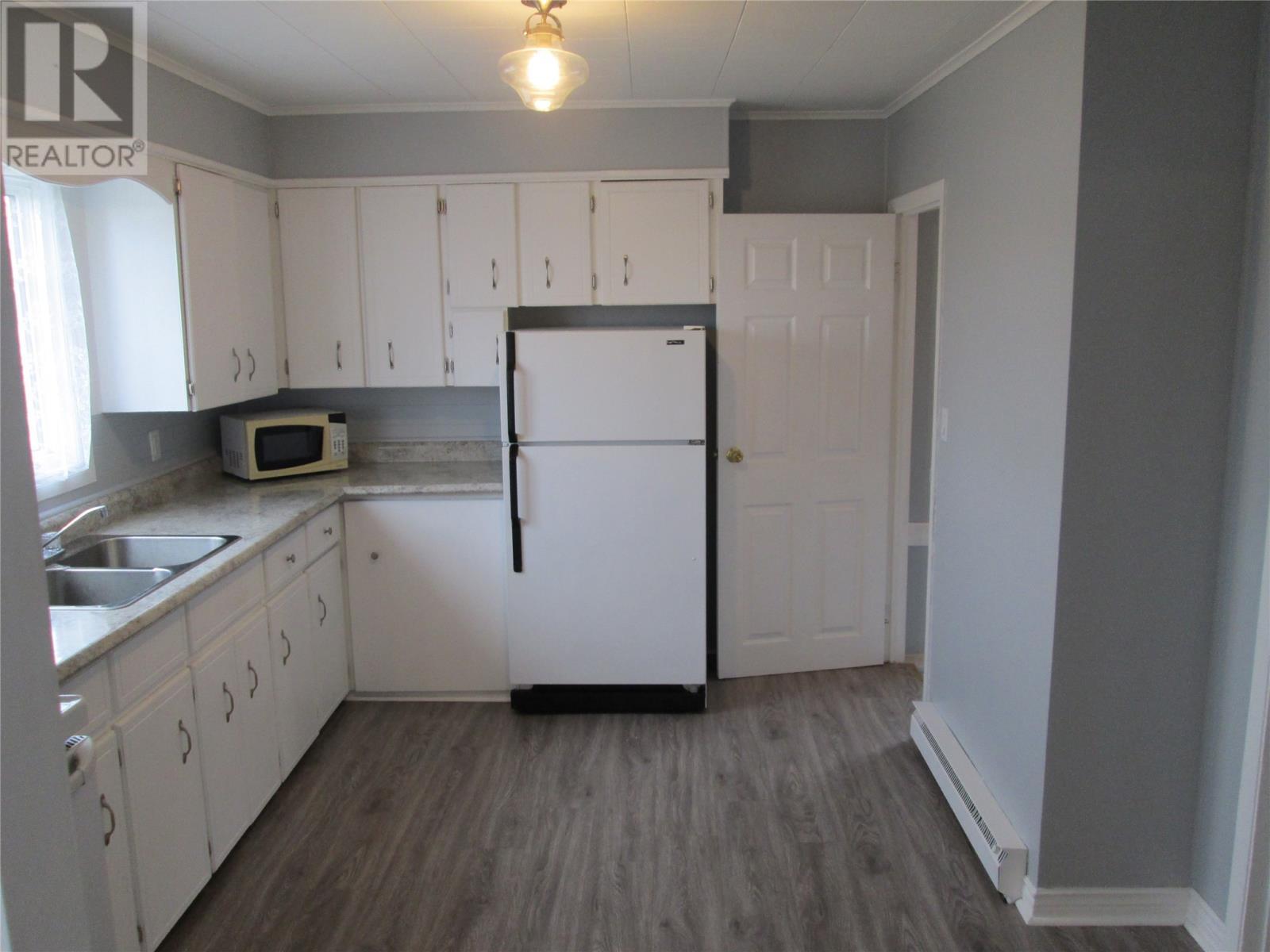 161 Main Street, Point Leamington, NL - Indoor Photo Showing Kitchen With Double Sink