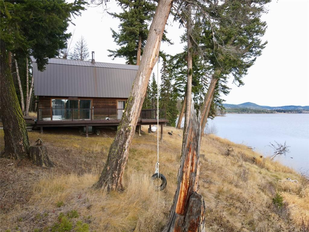 7902 Bell Rd. Road, Bridge Lake, BC - Outdoor With Body Of Water With Deck Patio Veranda With View
