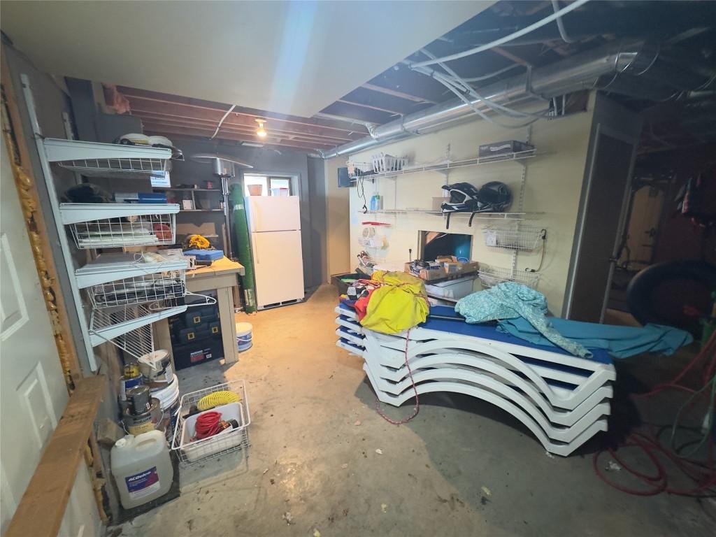 7902 Bell Rd. Road, Bridge Lake, BC - Indoor Photo Showing Garage