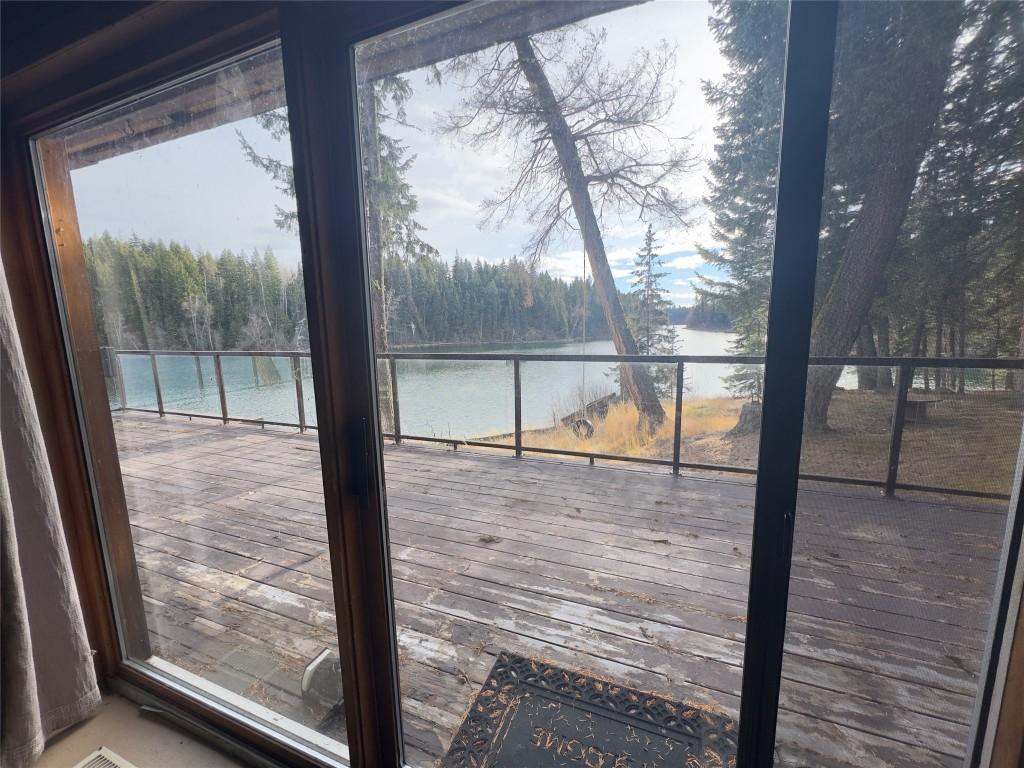 7902 Bell Rd. Road, Bridge Lake, BC - Photo Showing Other Room With Body Of Water