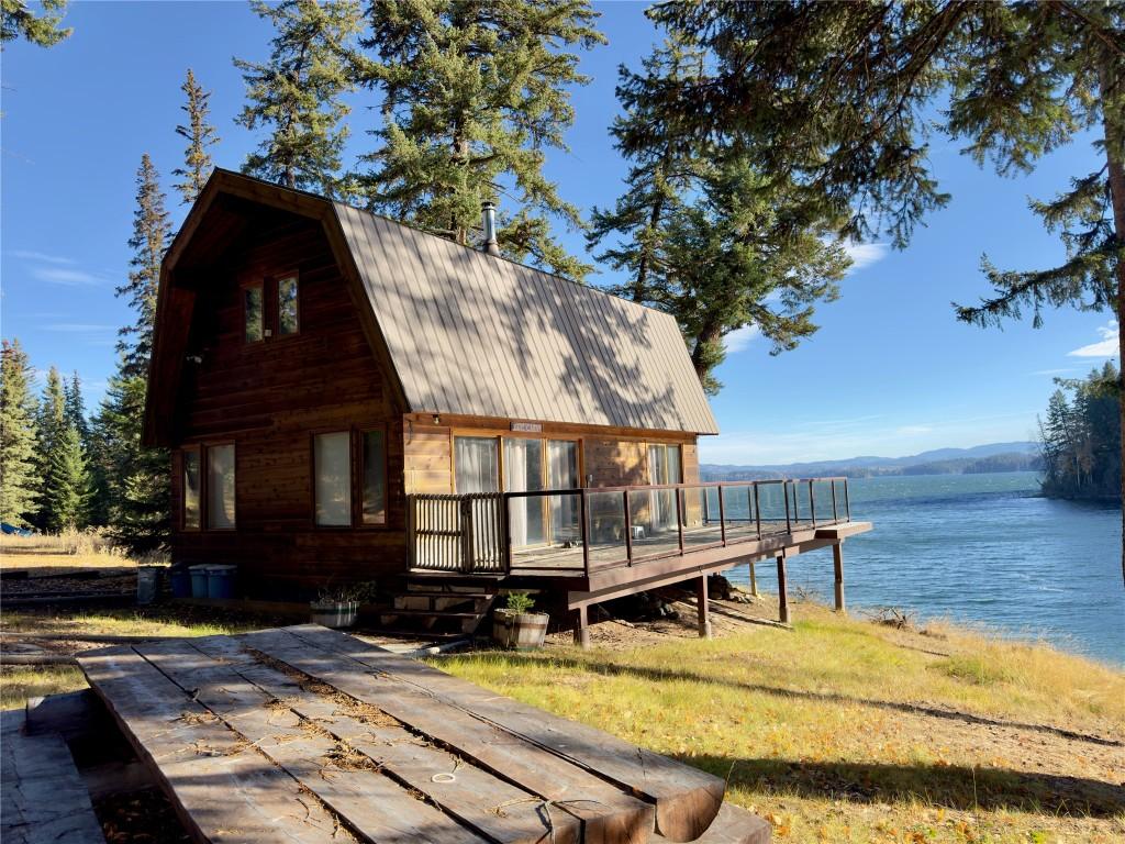 7902 Bell Rd. Road, Bridge Lake, BC - Outdoor With Body Of Water With Deck Patio Veranda