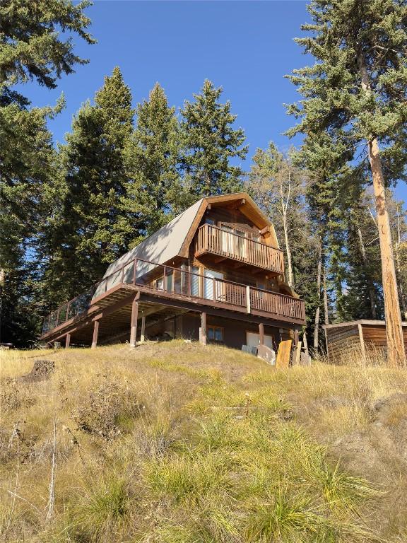 7902 Bell Rd. Road, Bridge Lake, BC - Outdoor With Deck Patio Veranda