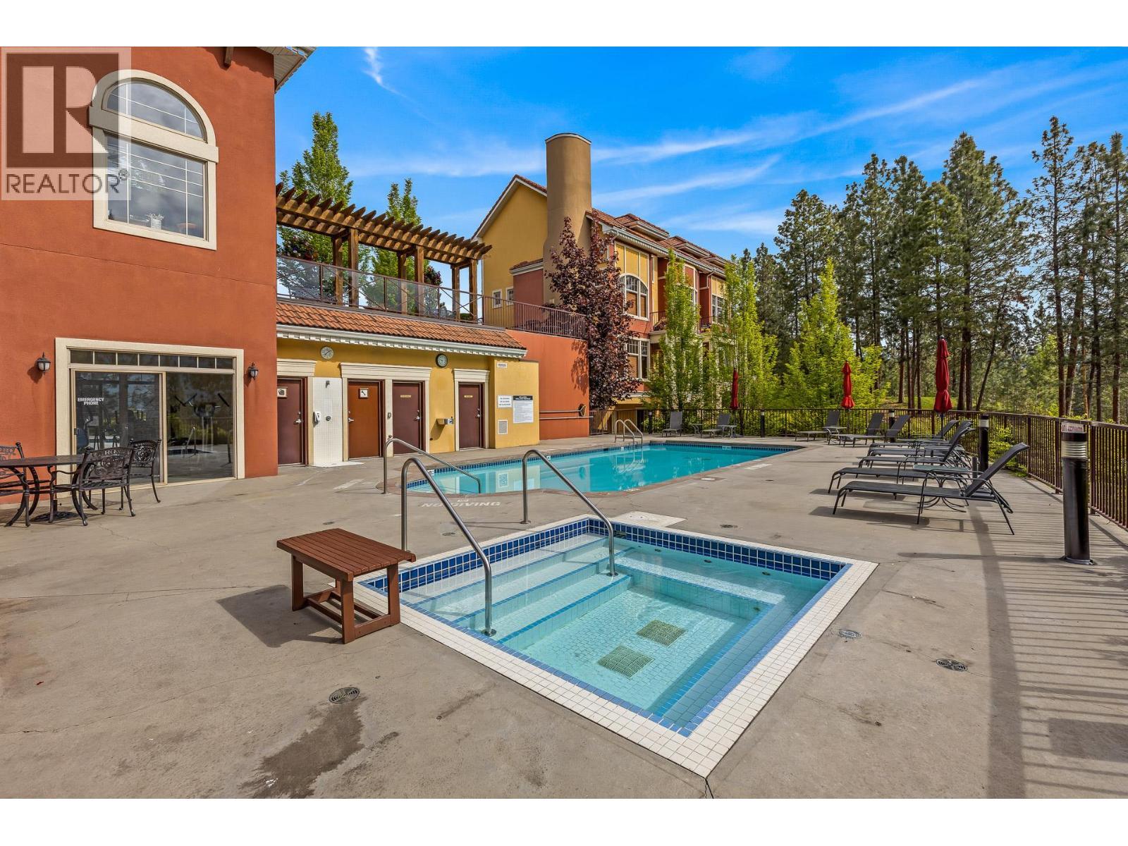 1795 Country Club Drive Unit# 201, Kelowna, BC - Outdoor With In Ground Pool