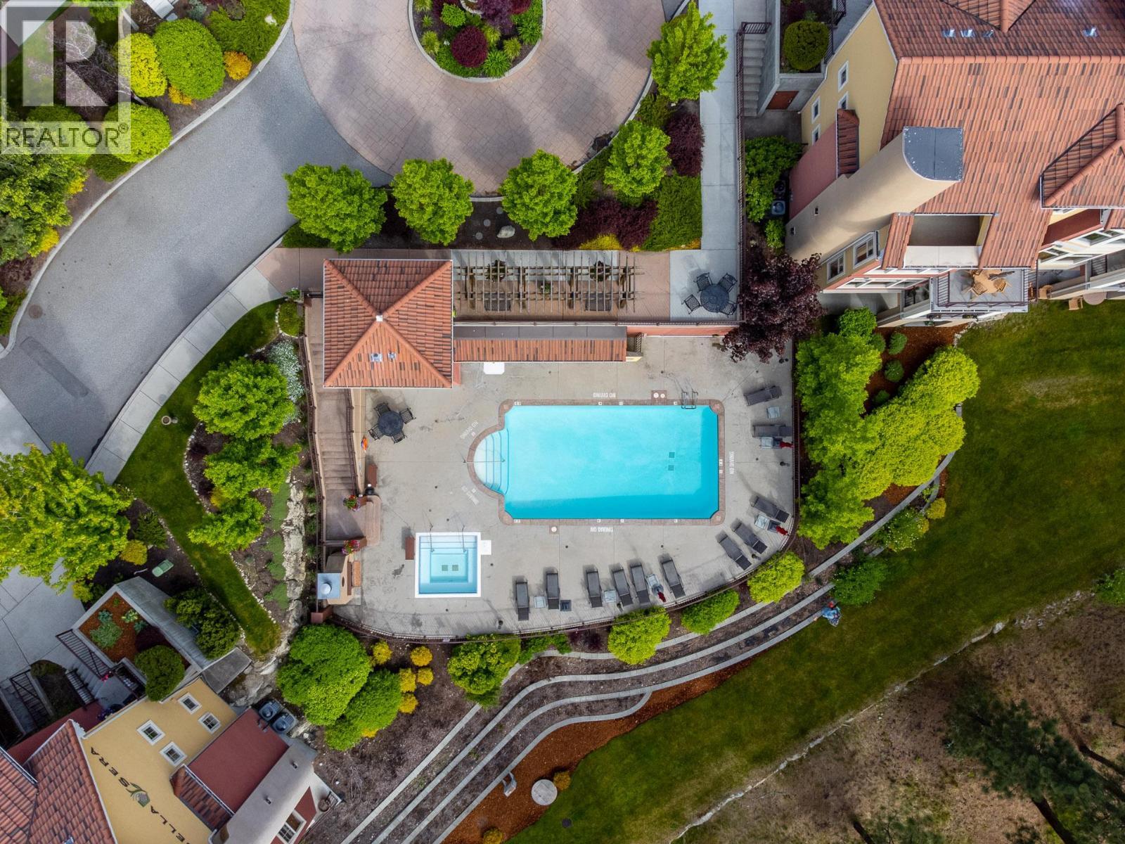1795 Country Club Drive Unit# 201, Kelowna, BC - Outdoor With In Ground Pool With View