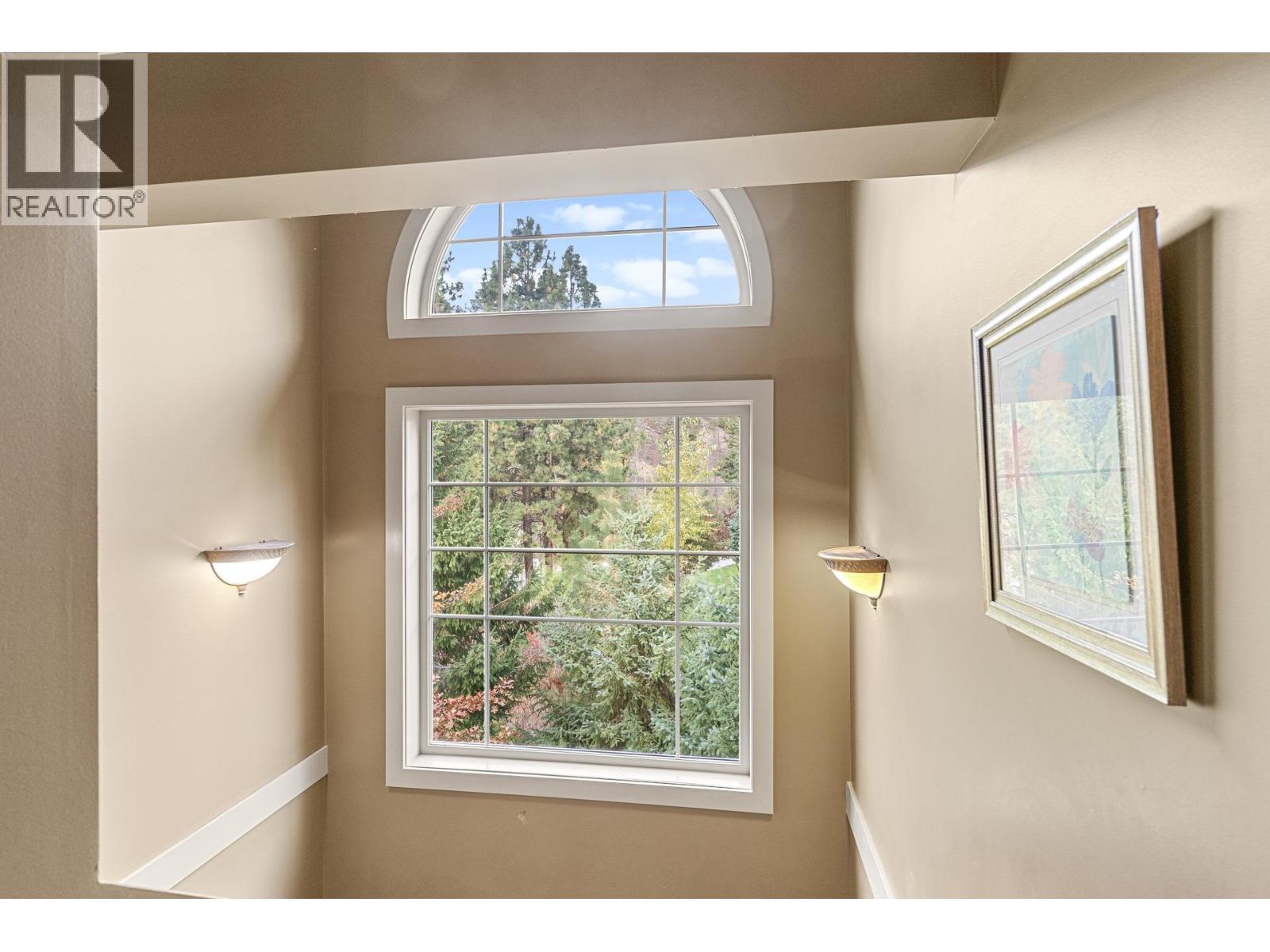 Going upstairs - 1795 Country Club Drive Unit# 201, Kelowna, BC - Indoor Photo Showing Other Room