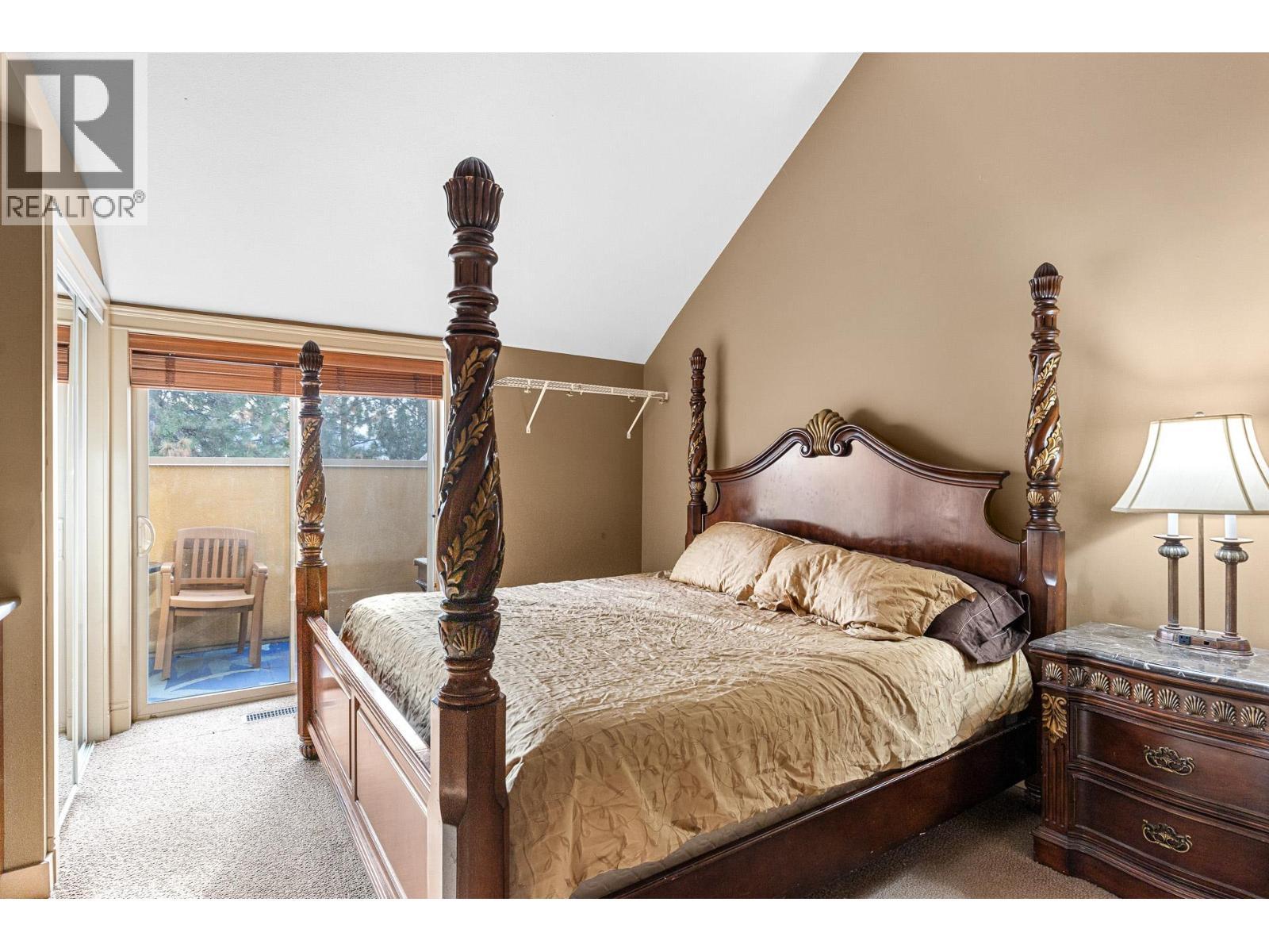 Primary Bedroom - 1795 Country Club Drive Unit# 201, Kelowna, BC - Indoor Photo Showing Bedroom