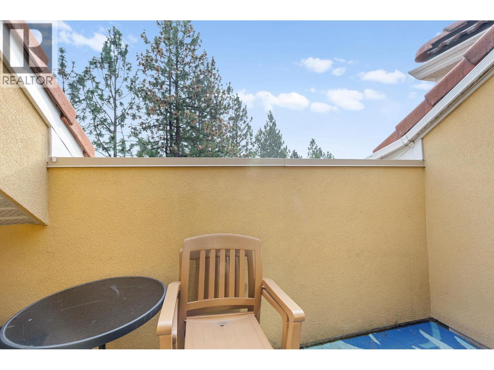 Balcony off Primary Bedroom - 1795 Country Club Drive Unit# 201, Kelowna, BC - Outdoor With Exterior