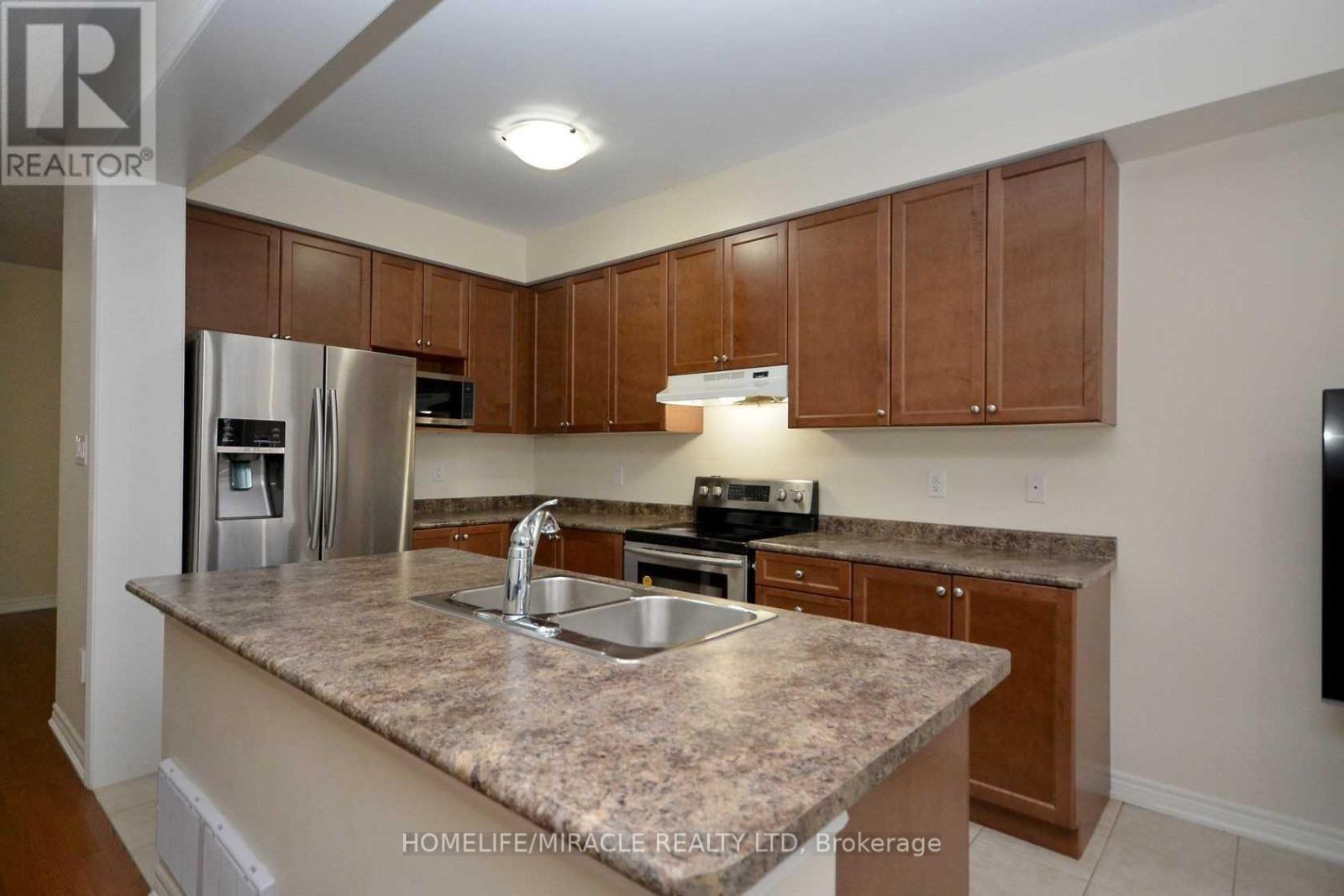 25 Antibes Drive, Brampton, ON - Indoor Photo Showing Kitchen With Stainless Steel Kitchen With Double Sink