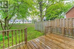 Wooden deck featuring a residential view -