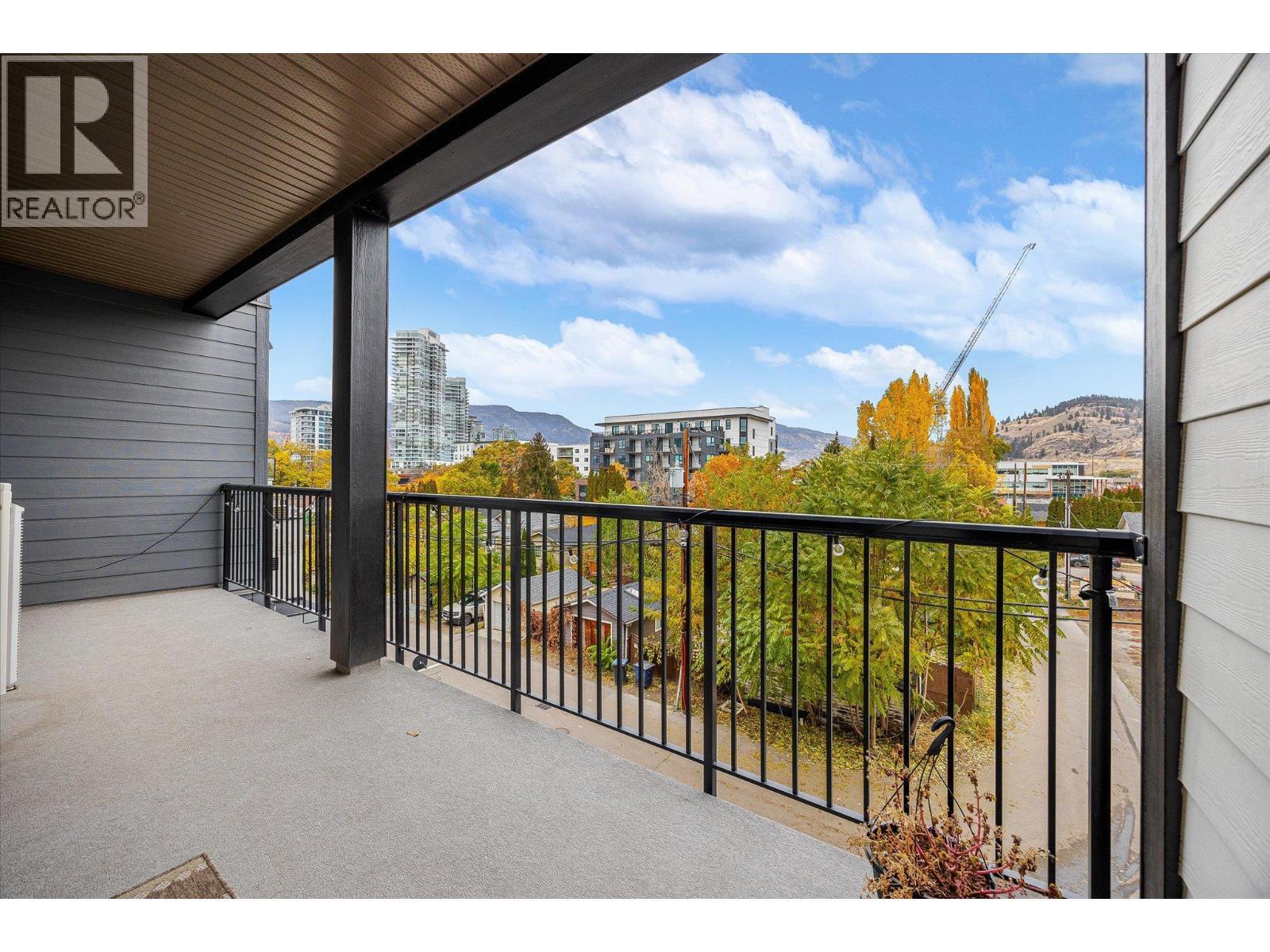 North facing balcony with views of Knox mountain. - 660 Cawston Avenue Unit# 313, Kelowna, BC - Outdoor With Exterior
