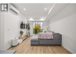 Access to the balcony through the living room. -