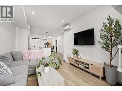 Open concept living, dining, and kitchen -