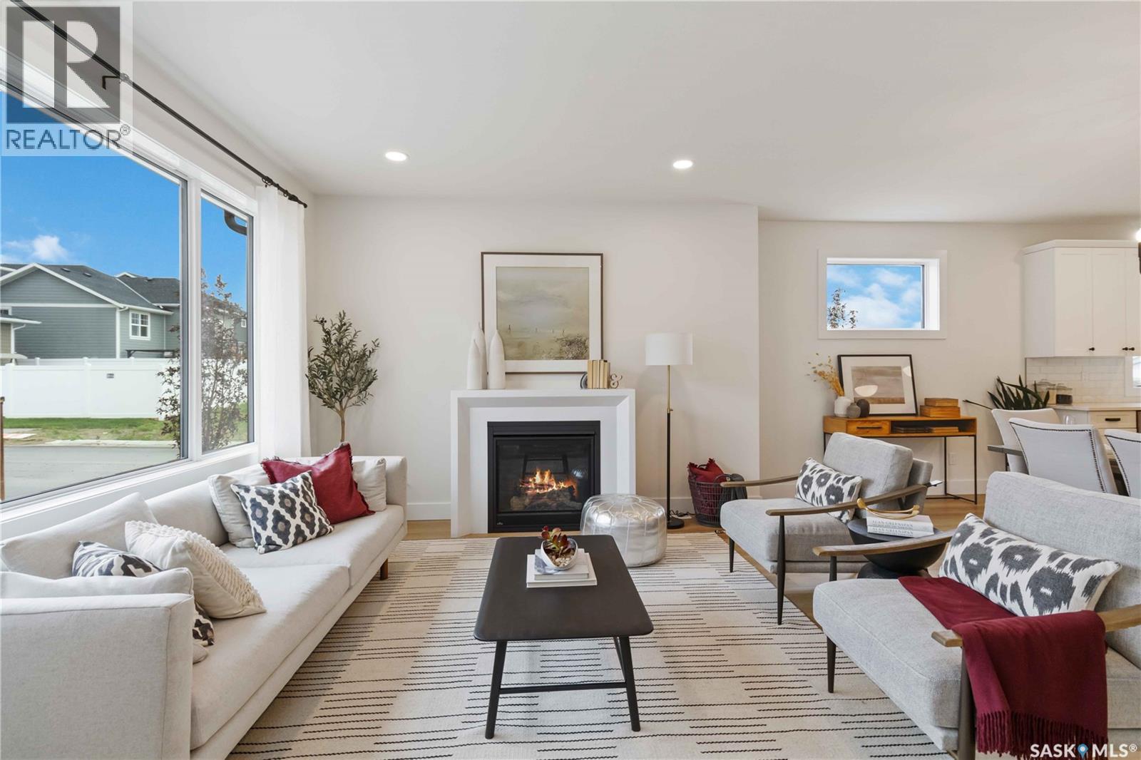 30 105 Hathway Crescent, Saskatoon, SK - Indoor Photo Showing Living Room With Fireplace