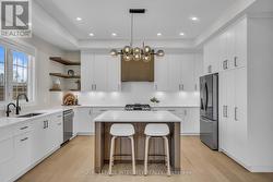 Chefs dream kitchen featuring a generous island -
